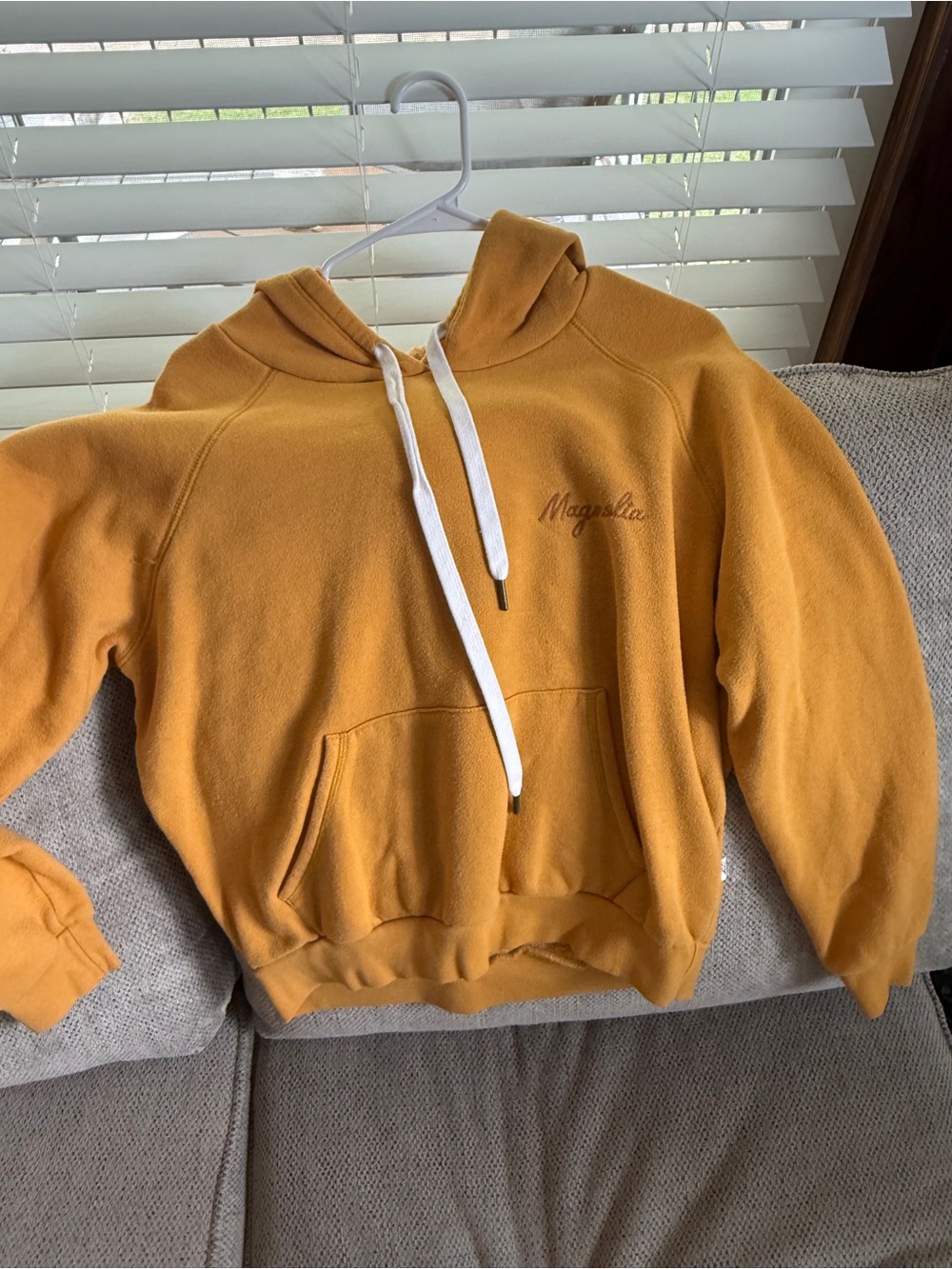 Magnolia Woman’s Mustard Crewneck Hoodie with White Drawstrings
